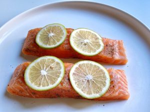 Season and Marinate (15 mins): Place the salmon strips on a plate. Sprinkle evenly with sea salt and black pepper. Squeeze fresh lemon juice over the top. Let it sit at room temperature for exactly 15 minutes.
