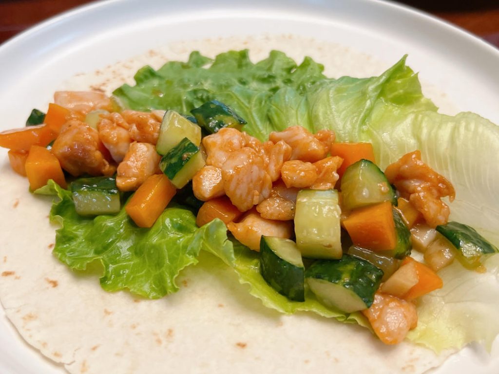 Assemble the Wraps: Lay a flour tortilla flat. Place a lettuce leaf in the center. Spoon a generous amount of the chicken and vegetable mixture onto the lettuce. Squeeze your preferred BBQ sauce over the top, roll it up tightly, and serve immediately.