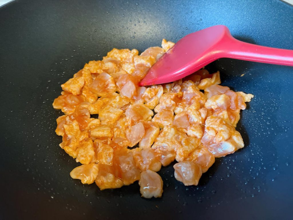 Sear the Chicken: Heat 1 tablespoon of cooking oil in your skillet over medium-high heat. Add the diced chicken in a single layer. Sear until the exterior changes color and is mostly cooked through, about 2-3 minutes. Remove the chicken from the pan and set it aside on a plate. Why? This prevents the chicken from overcooking and becoming rubbery while you cook the vegetables.