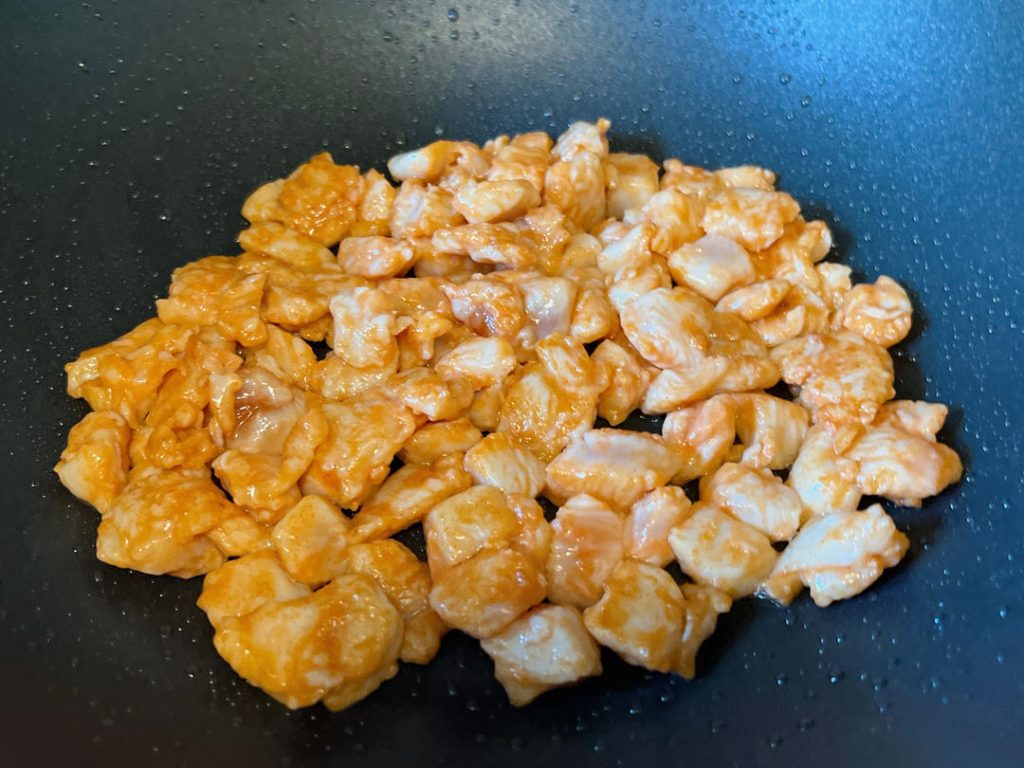 Sear the Chicken: Heat 1 tablespoon of cooking oil in your skillet over medium-high heat. Add the diced chicken in a single layer. Sear until the exterior changes color and is mostly cooked through, about 2-3 minutes. Remove the chicken from the pan and set it aside on a plate. Why? This prevents the chicken from overcooking and becoming rubbery while you cook the vegetables.