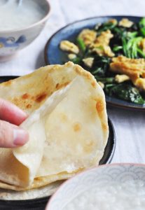 Separate Remove from the pan. While it is still warm, find the seam on the edge and gently peel the two pancakes apart.