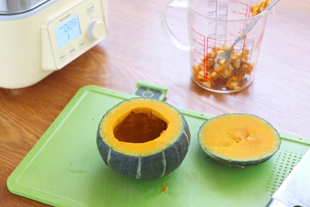 Prepare the Pumpkin Slice the top off the pumpkin (about 1/4 of the way down) to create a lid. Use a spoon to scrape out the seeds and fibrous innards.
