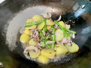 Add the Flavor: Toss in the dried bamboo shoots. Stir-fry for another 30 seconds to release their deep, earthy fragrance.