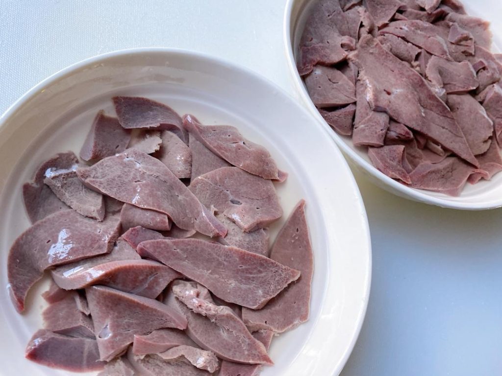 Soak (The most important step): Submerge the liver slices in a bowl of cold water for 30 minutes. Gently massage the slices and change the water 2 to 3 times until the water runs mostly clear.
