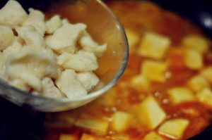 Final Stewing Gently slide the blanched fish into the pot. Turn the heat down to low. Simmer for another 1-2 minutes to let the flavors meld. Be gentle when stirring to avoid breaking the tofu or fish.