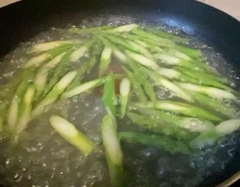 Asparagus Prep: Cut the asparagus on a bias (rolling cut) to expose more surface area. Snap off and discard the woody, tough ends.