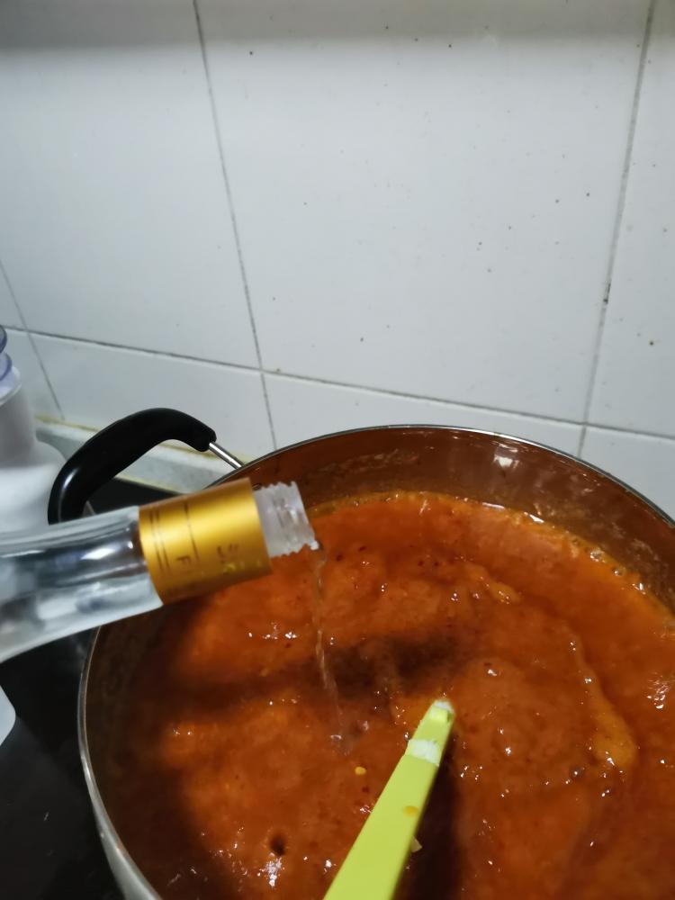 The Final Touch: Stir in a small splash of white spirit (Baijiu). This helps stabilize the sauce and adds a subtle floral note.