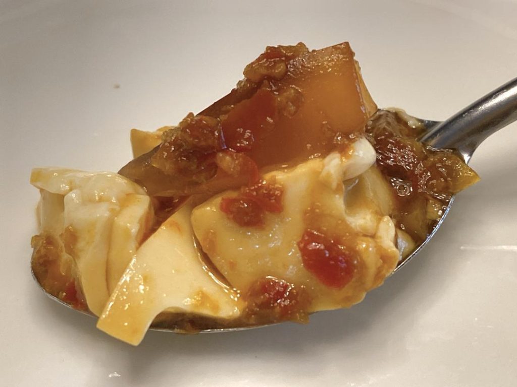 The Secret Chef's Step: Use a spoon to gently nudge or lightly score the tofu. This slight loosening allows the savory sauce to seep into the cracks, flavoring every bite perfectly.