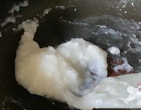 Incorporate the Filling: Continue stirring the flour mixture over low heat until it forms a thick, translucent paste. Pour the reserved sesame and walnut mixture directly into the saucepan.