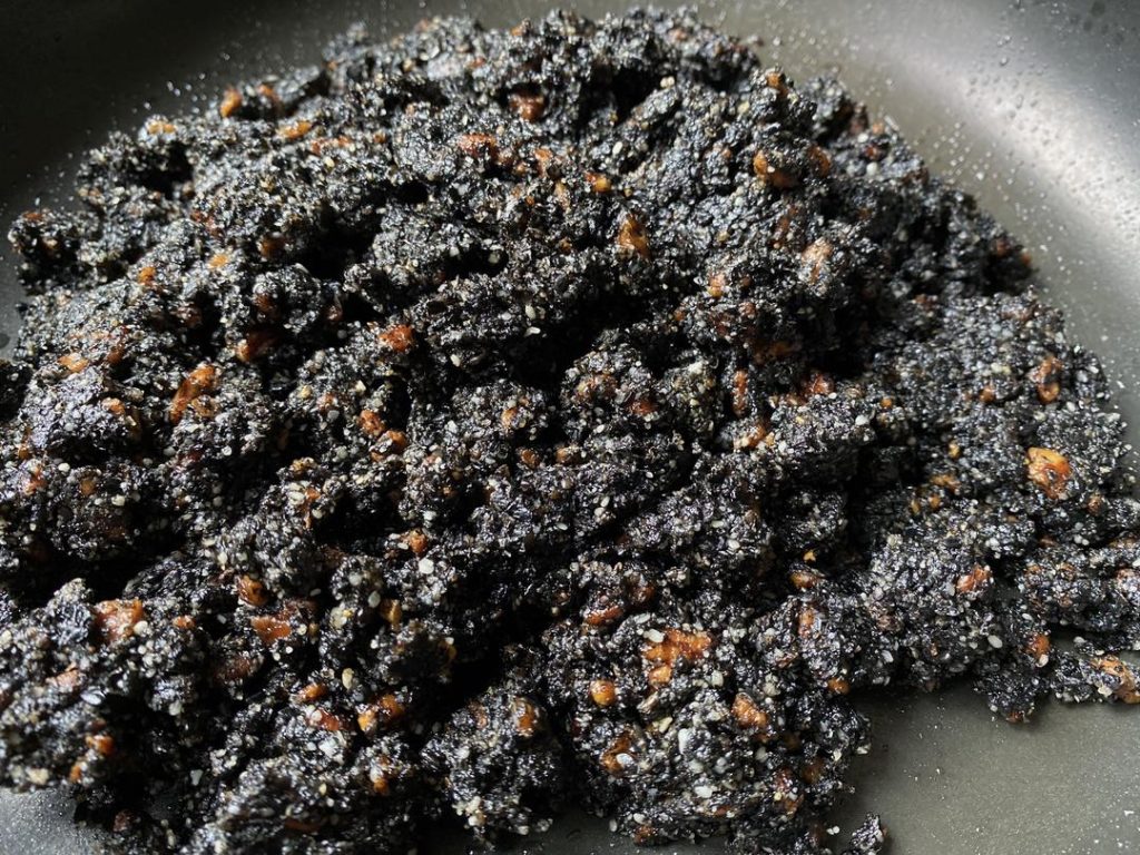Final Stir-Fry: Fold the ingredients together constantly over low heat for 1 to 2 minutes, just until the mixture is cohesive and everything is evenly distributed. Do not use high heat, or the sesame will scorch and turn bitter.