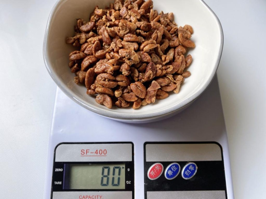 Crush the Walnuts: Place the roasted walnuts in a heavy-duty ziplock bag and crush them gently with a rolling pin. Do not use a food processor for this step; blending them will turn the nuts into fine dust, and you will lose the signature textural contrast of the filling.