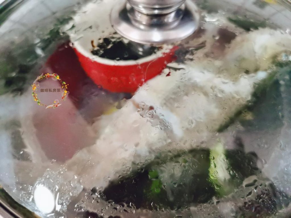 Once your steamer is at a rolling boil (producing plenty of steam), place the fish plate and the small bowl of soy sauce inside the steamer.