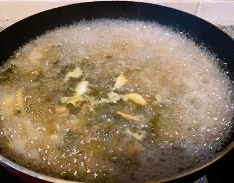 Build the Soup: Pour in the pork bone broth and water. Bring to a rolling boil. Season the broth with 1 tablespoon each of Shaoxing wine, soy sauce, oyster sauce, salt, and sugar.