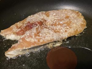 Pan-Fry (8-10 mins total): Heat a generous amount of oil in your skillet over medium-low heat (around 320°F / 160°C). Gently place the fish slices into the pan.