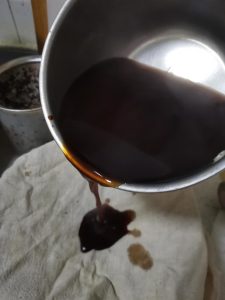 Strain and cool: Turn off the heat. Use a slotted spoon or spider to scoop out the large solids. Then, pass the liquid through a fine-mesh strainer lined with cheesecloth into a large bowl to catch all the gritty bits.