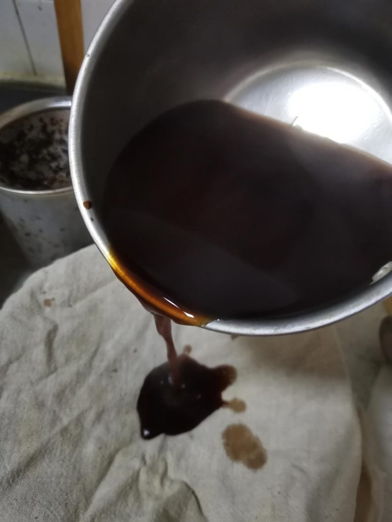 Strain and cool: Turn off the heat. Use a slotted spoon or spider to scoop out the large solids. Then, pass the liquid through a fine-mesh strainer lined with cheesecloth into a large bowl to catch all the gritty bits.
