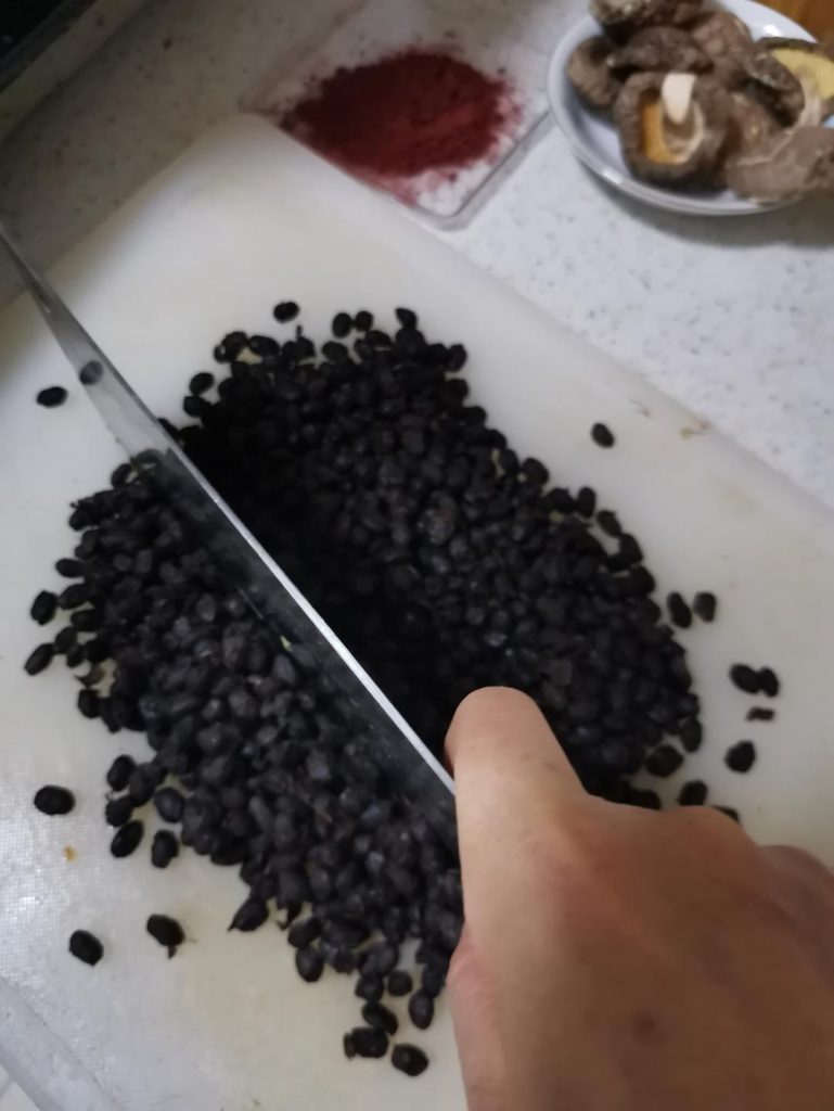 Chop the beans: Finely chop the 220g of fermented black beans. This increases their surface area, allowing them to release their flavors into the water much faster.