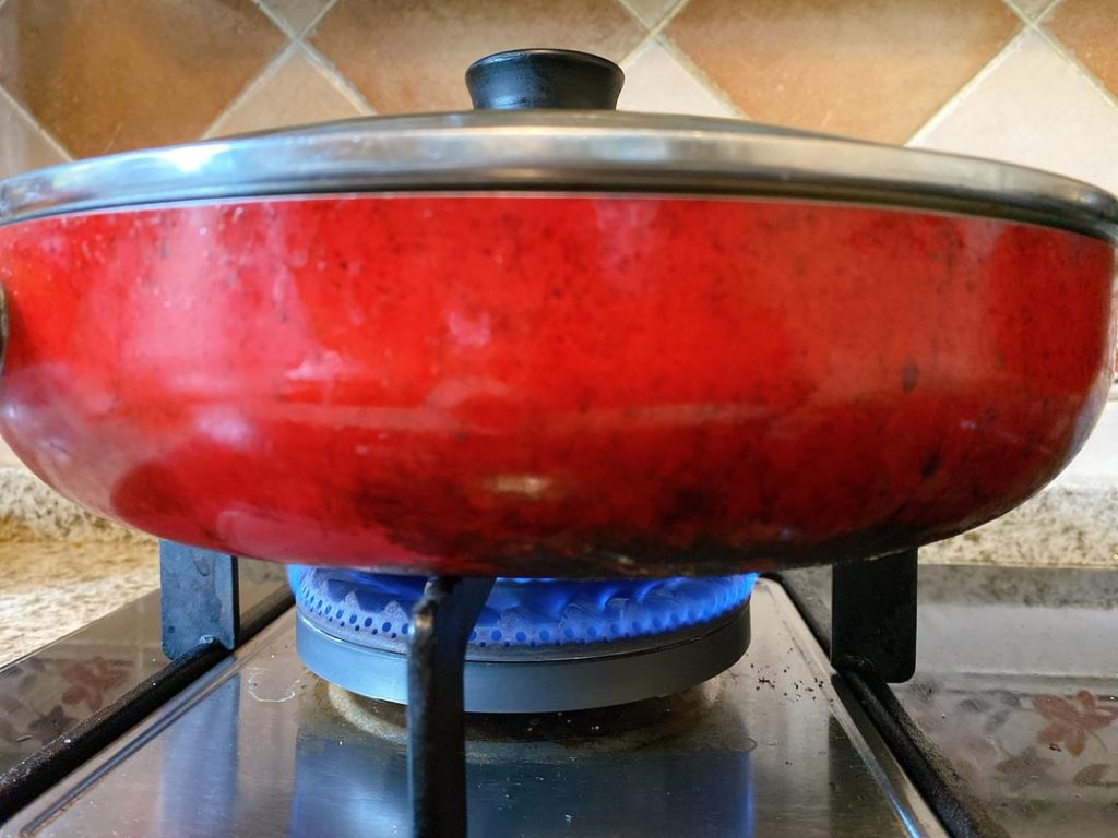 Steam to Soften
Pour roughly 3 tablespoons (50g/50ml) of water around the inner edges of the wok. Cover immediately with a lid. Let it simmer over medium-low heat for 3 to 4 minutes.