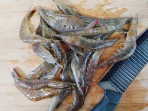 Clean the Shrimp: Use shears to trim the antennae, legs, and the sharp "spear" on the head.