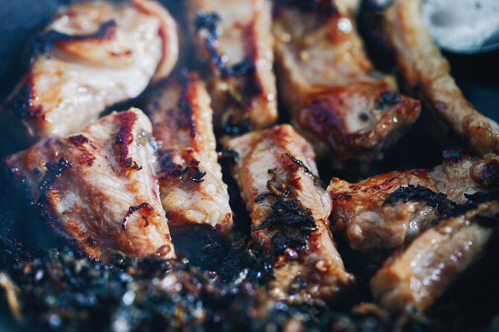 Mix the ribs and greens together. Add the 2 tablespoons of soy sauce, sugar, and a pinch of salt. Always taste a small bit of the sauce to ensure the balance is right before proceeding.