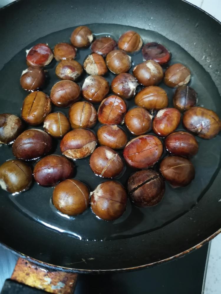 Add Water: Pour in the water. The water level should reach about 2/3 of the way up the sides of the chestnuts.