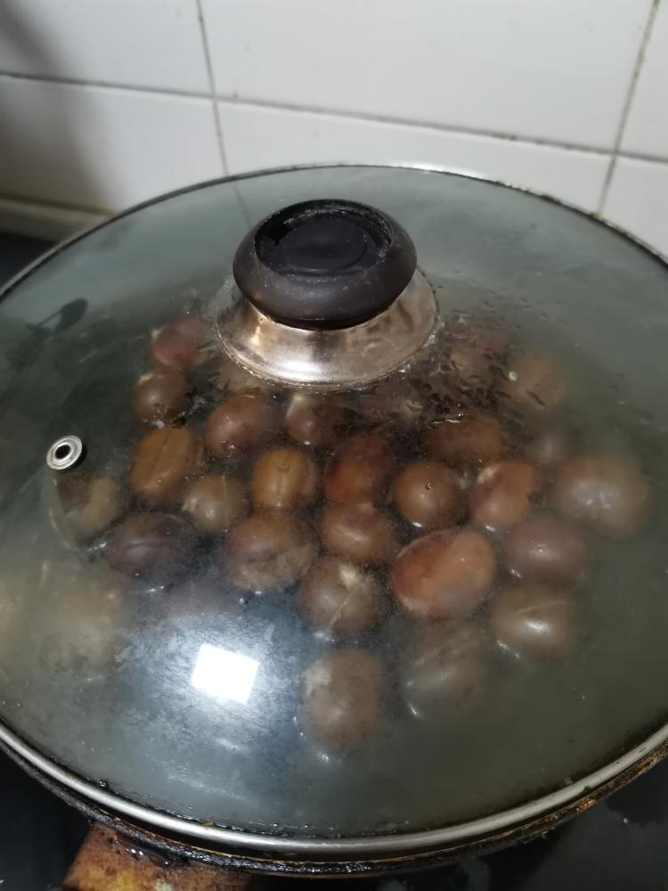 Steam (10 minutes): Cover the pan with a tight-fitting lid and turn the heat to medium. Let the chestnuts gently boil and steam for about 10 minutes.