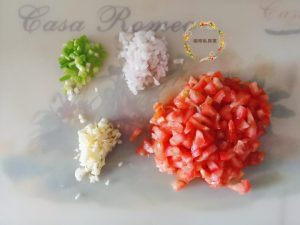 Dice the Tomatoes and Mince the garlic, shallots, and the white part of the scallion.