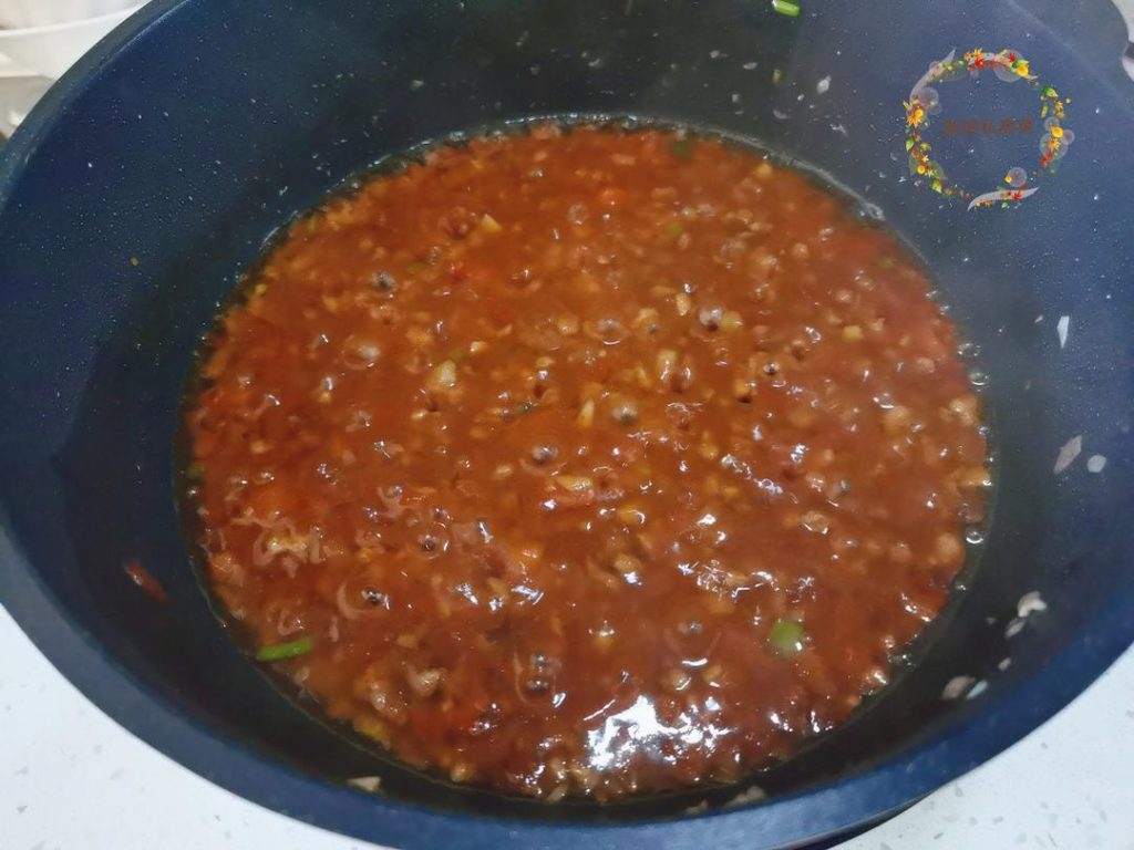 Season: Add the light soy sauce, oyster sauce, pepper, sugar, and salt. Stir well to combine the flavors.