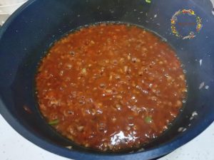 Season: Add the light soy sauce, oyster sauce, pepper, sugar, and salt. Stir well to combine the flavors.