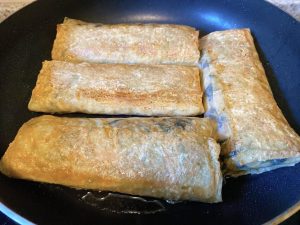 Pan-Fry: Heat 2 tablespoons of oil in a non-stick pan over medium-low heat (around 300°F / 150°C). Carefully place the rolls in the pan, seam-side down. Pan-fry until golden brown and crispy on both sides (about 3-4 minutes per side).