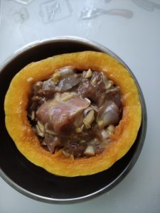 Filling: Pack the marinated duck into the pumpkin bowl. Don't overpack; leave a little space for the steam to circulate.