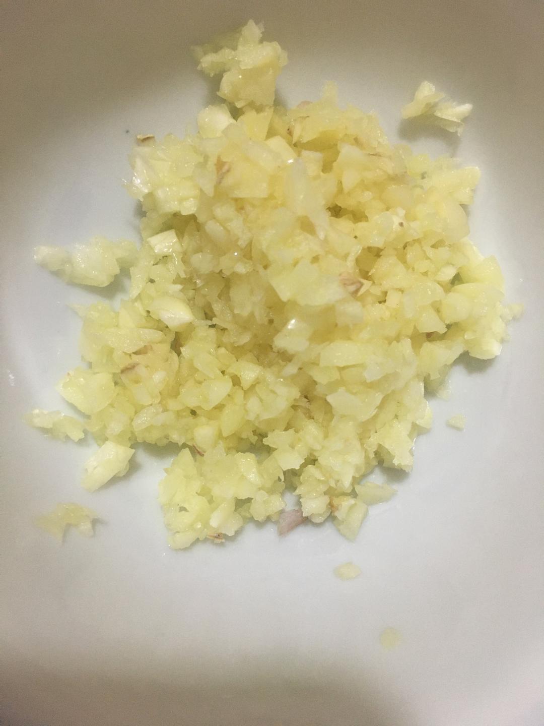 Mincing the garlic and boiling water