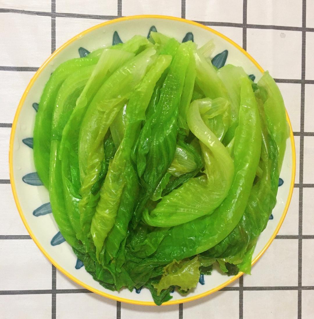 Draining and plating the lettuce