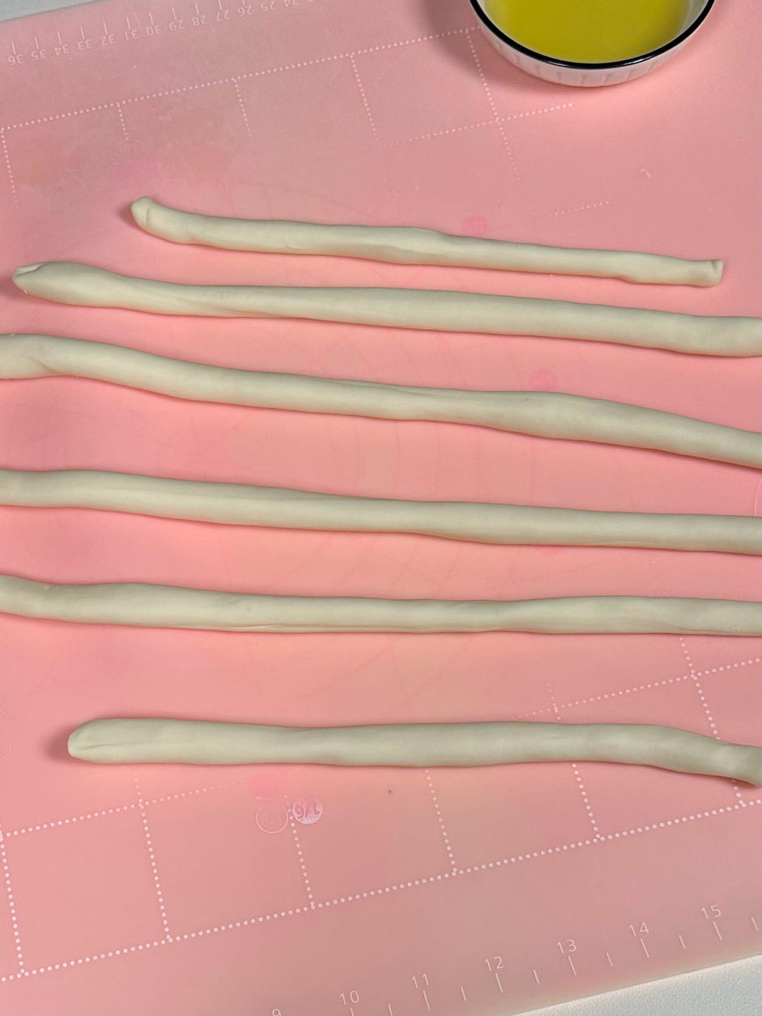Dividing dough into six equal portions