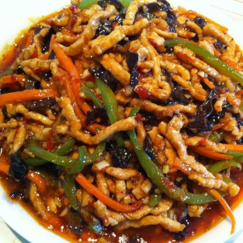 Authentic Yuxiang Rousi (Fish-Fragrant Pork) stir-fry in a wok