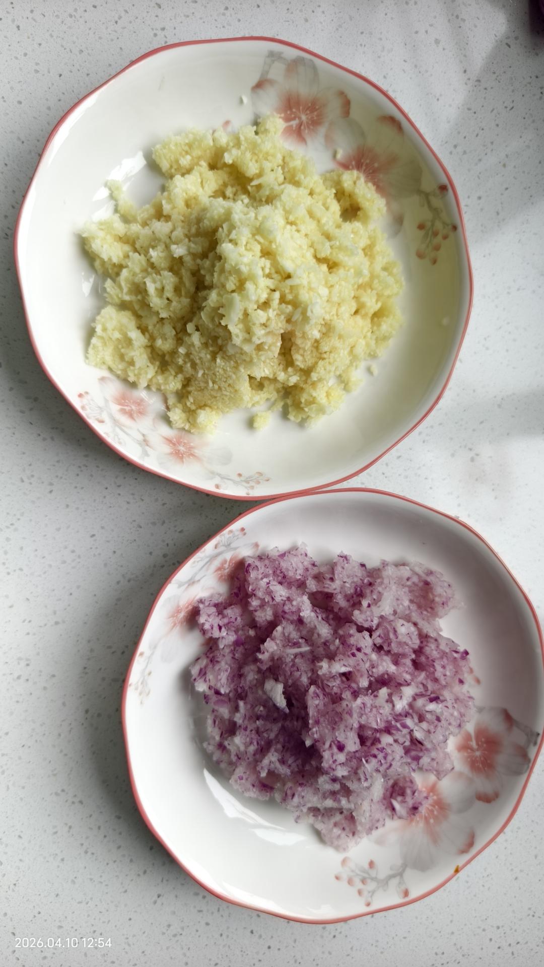 Mince the garlic and onion in a garlic press