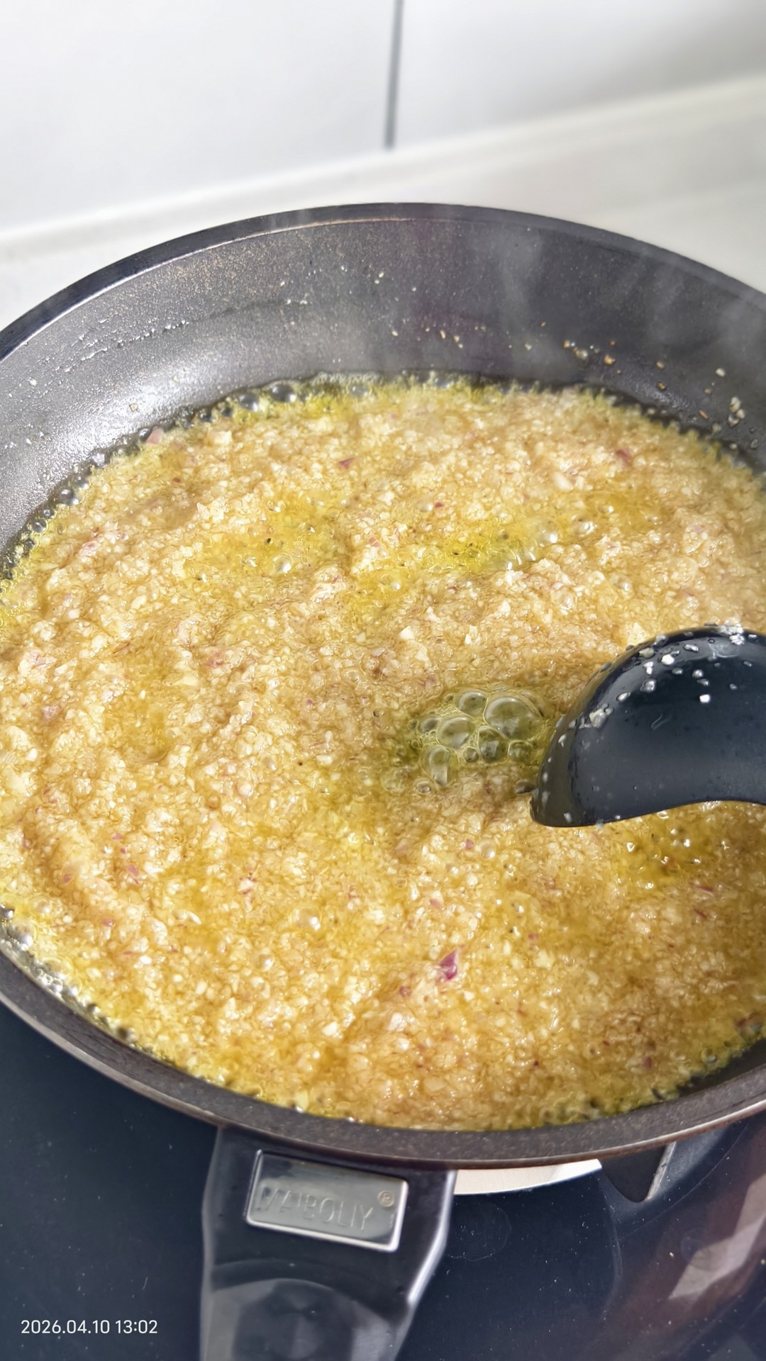 Add a little oil, tip in the onion and garlic