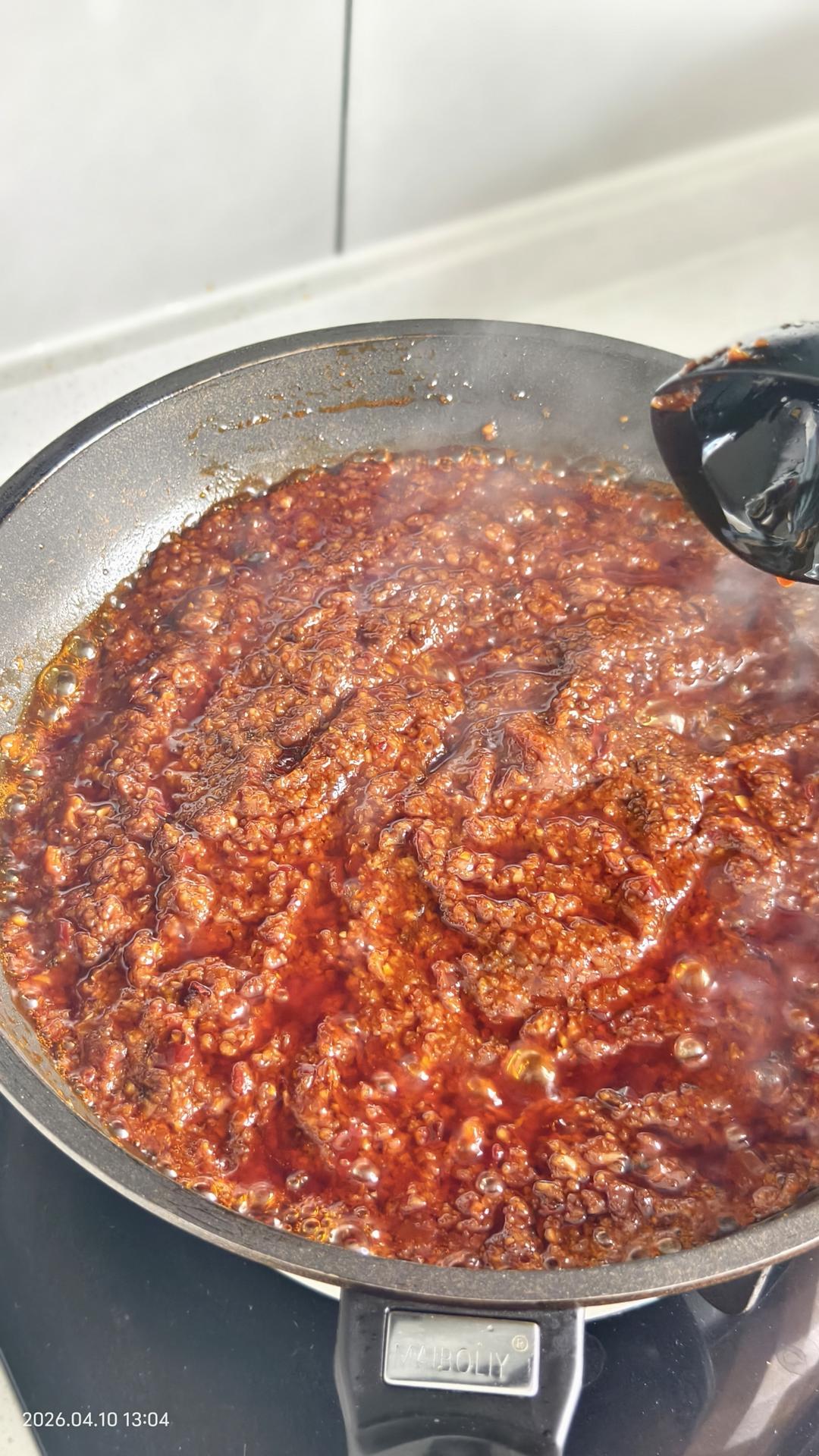 Add the three weighed pastes and stir-fry unt