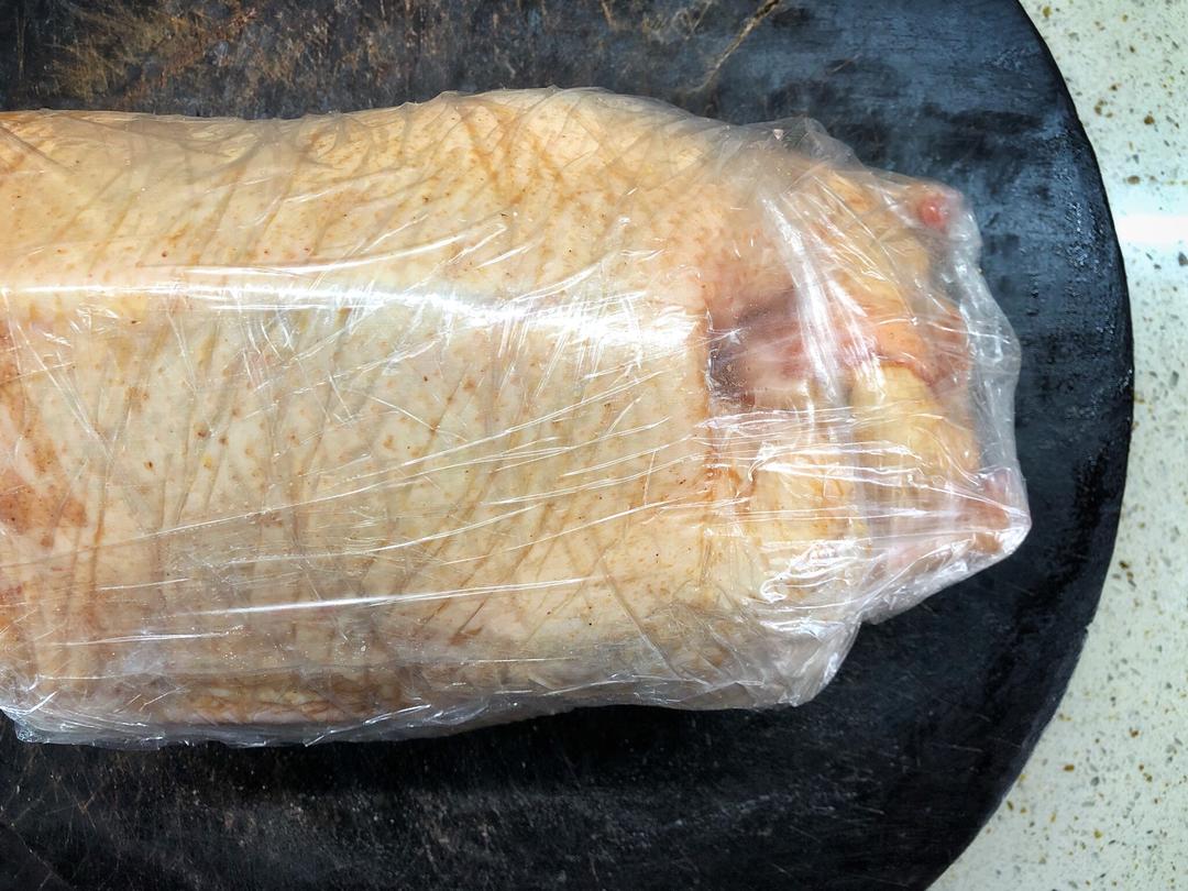 Wrap the stuffed duck in plastic and refrigerate overnight to marinate