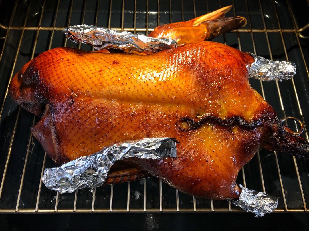 Flip the duck and roast twenty more minutes until deeply colored