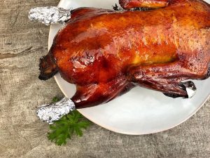 Rest the roasted duck for fifteen minutes before carving