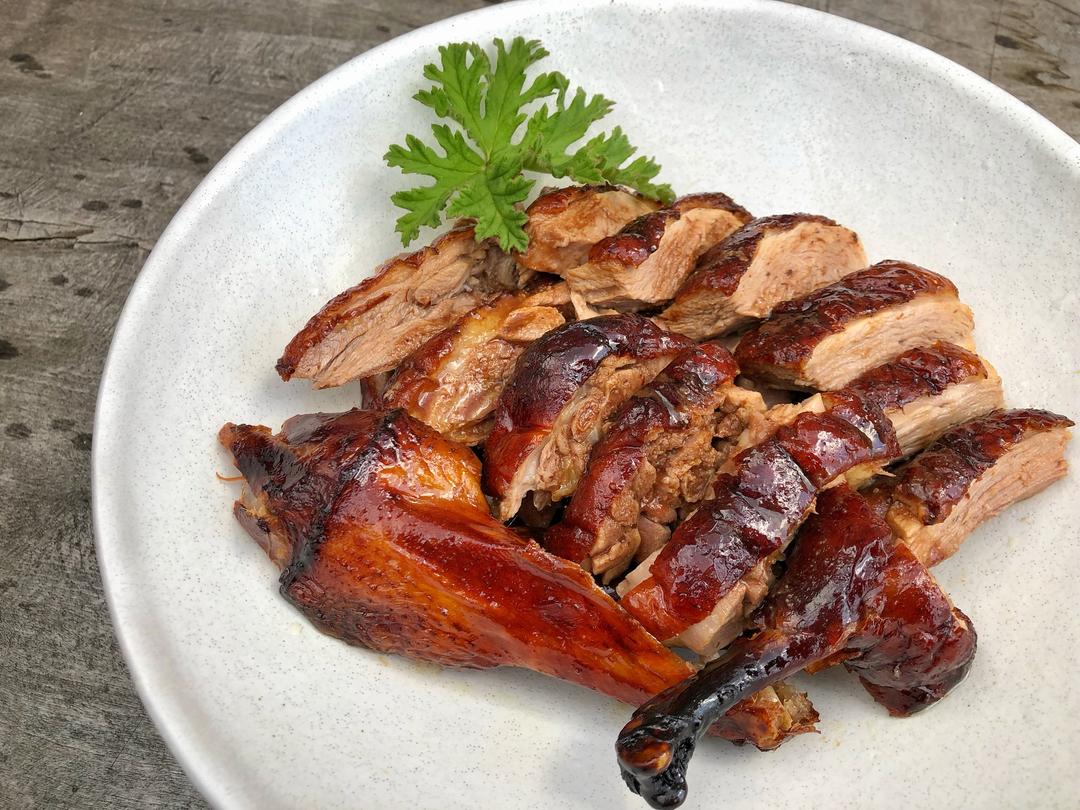 Unseal the cavity, pour out the juices, and carve the roast duck