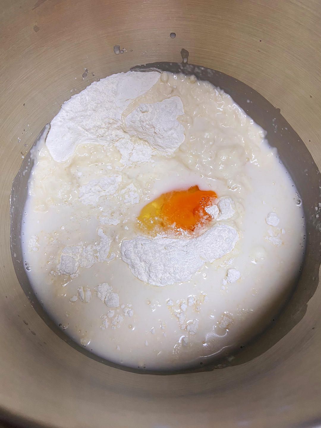 Mix all the dough ingredients except salt and butter, then knead for 10 minutes, adding the salt and softened butter at the 4-5 minute mark.