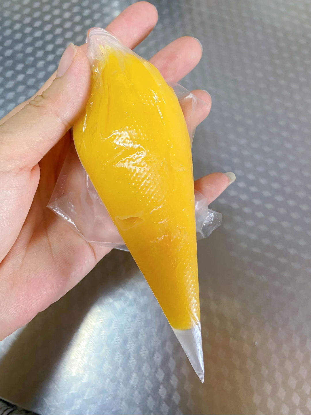 Let the cheese sauce cool until thick, then spoon it into a piping bag and set aside.