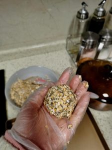 Shape the mixture into freehand balls on the nonstick tray