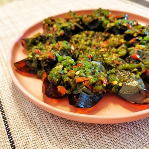 Chopped-chili century eggs dressed with sizzled aromatics