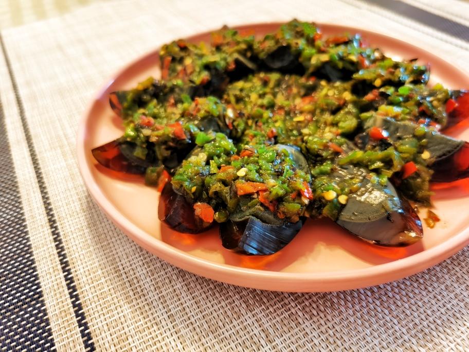 Chopped-chili century eggs dressed with sizzled aromatics