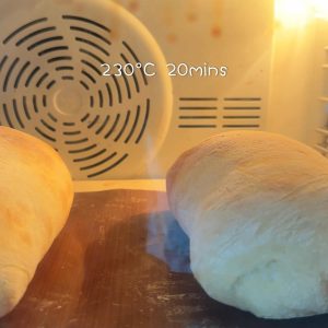 Spray the loaves and oven walls with water, then bake at 230 degrees C for about 20 minutes.