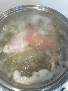 Build the braising liquid with soy, wine, and aromatics