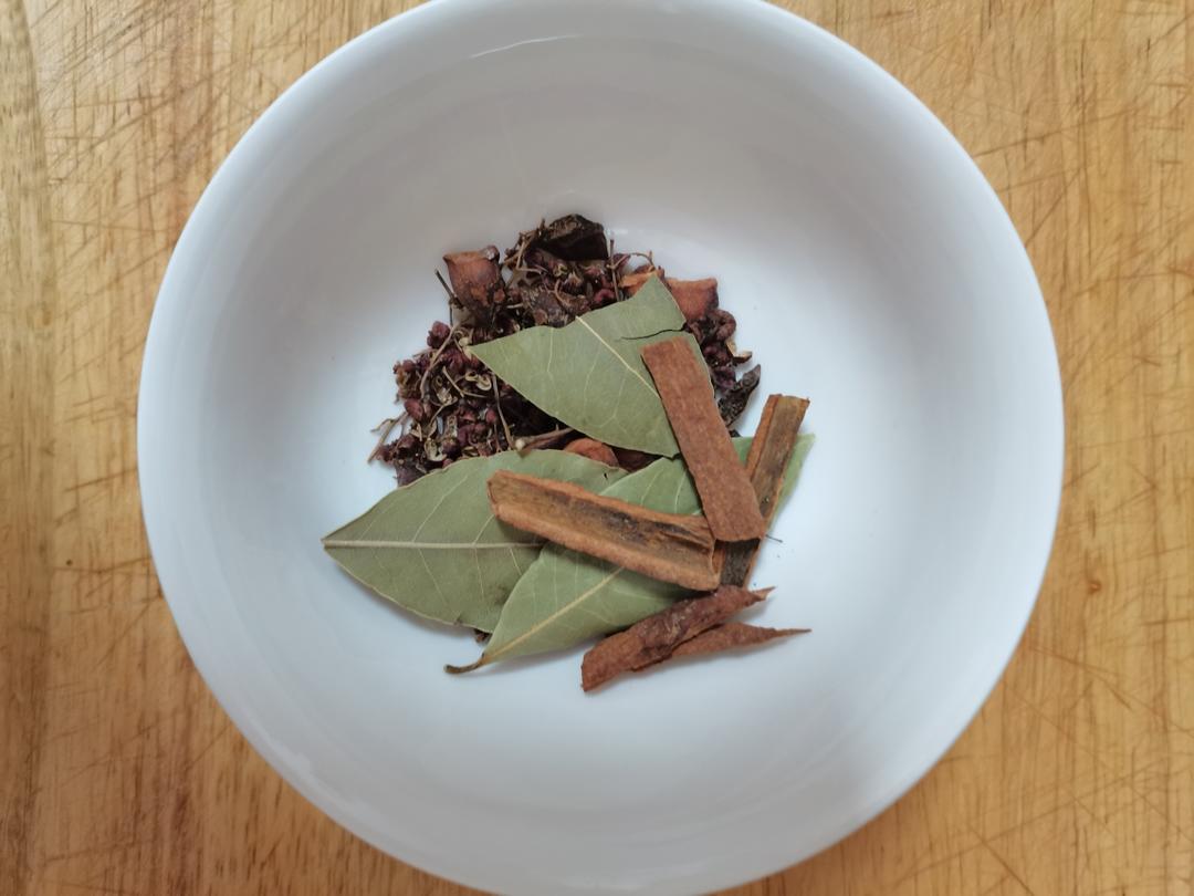 Sichuan peppercorns + star anise + bay leaves